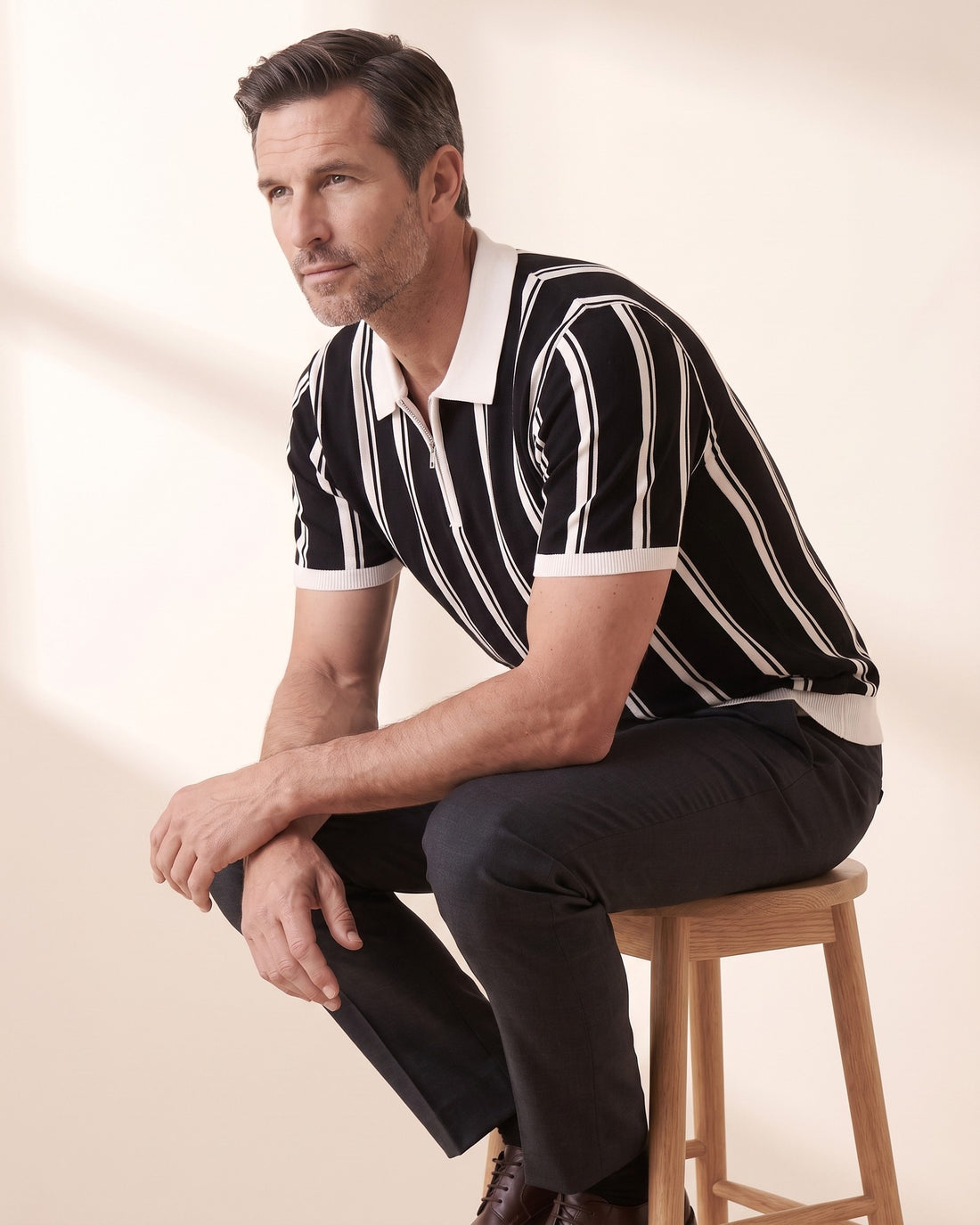 KEPT Men's Half-Zip Polo - Modena in black, in motion