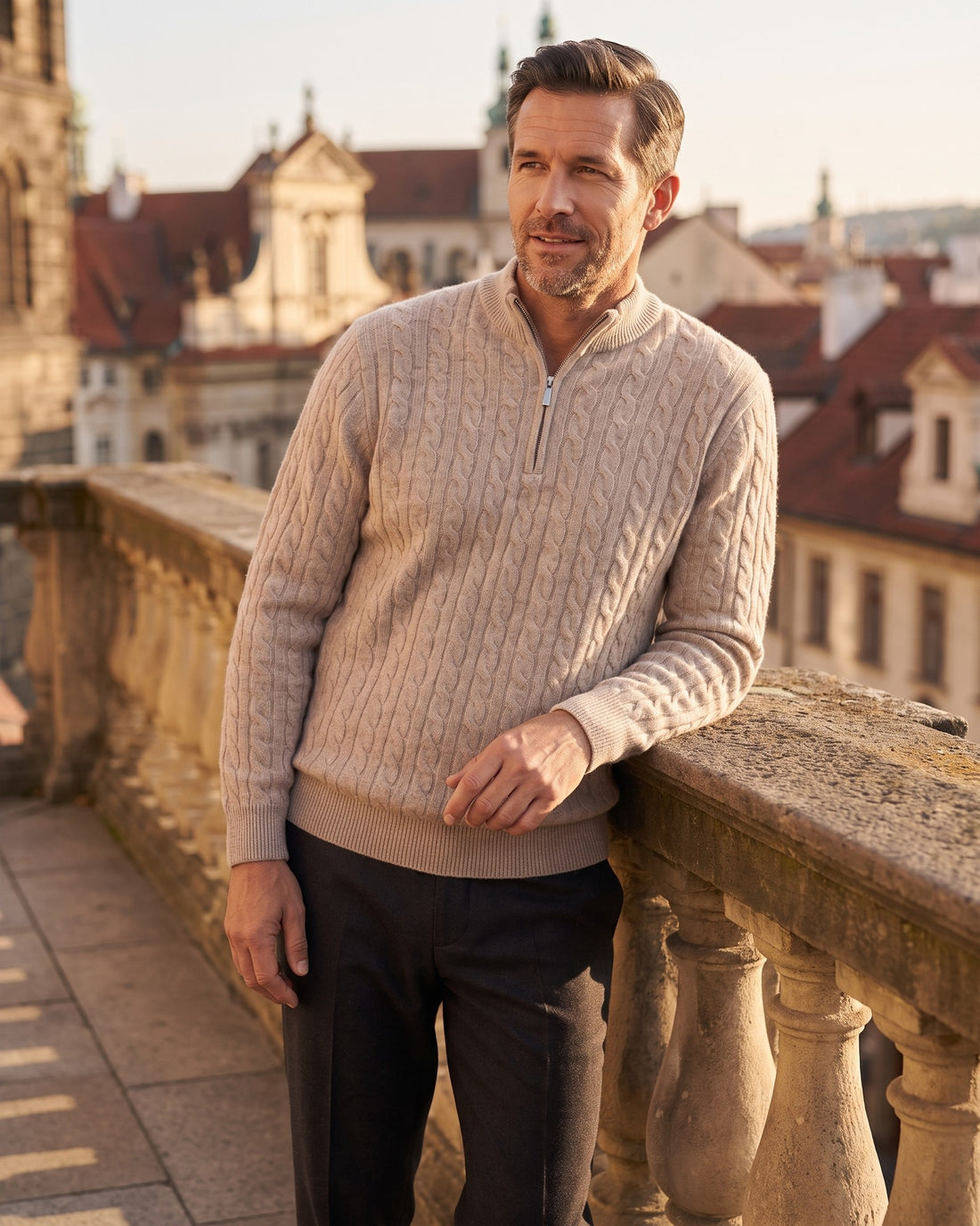 KEPT Men's Half-Zip Sweater - Siena in beige, worn on a terrace
