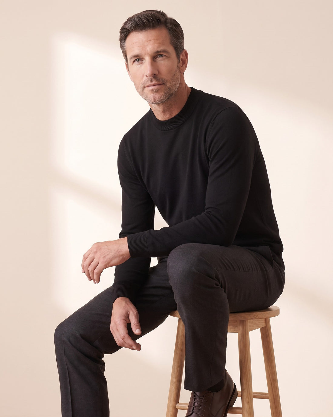 KEPT Men's Mock Neck Sweater - Trento in black, in motion