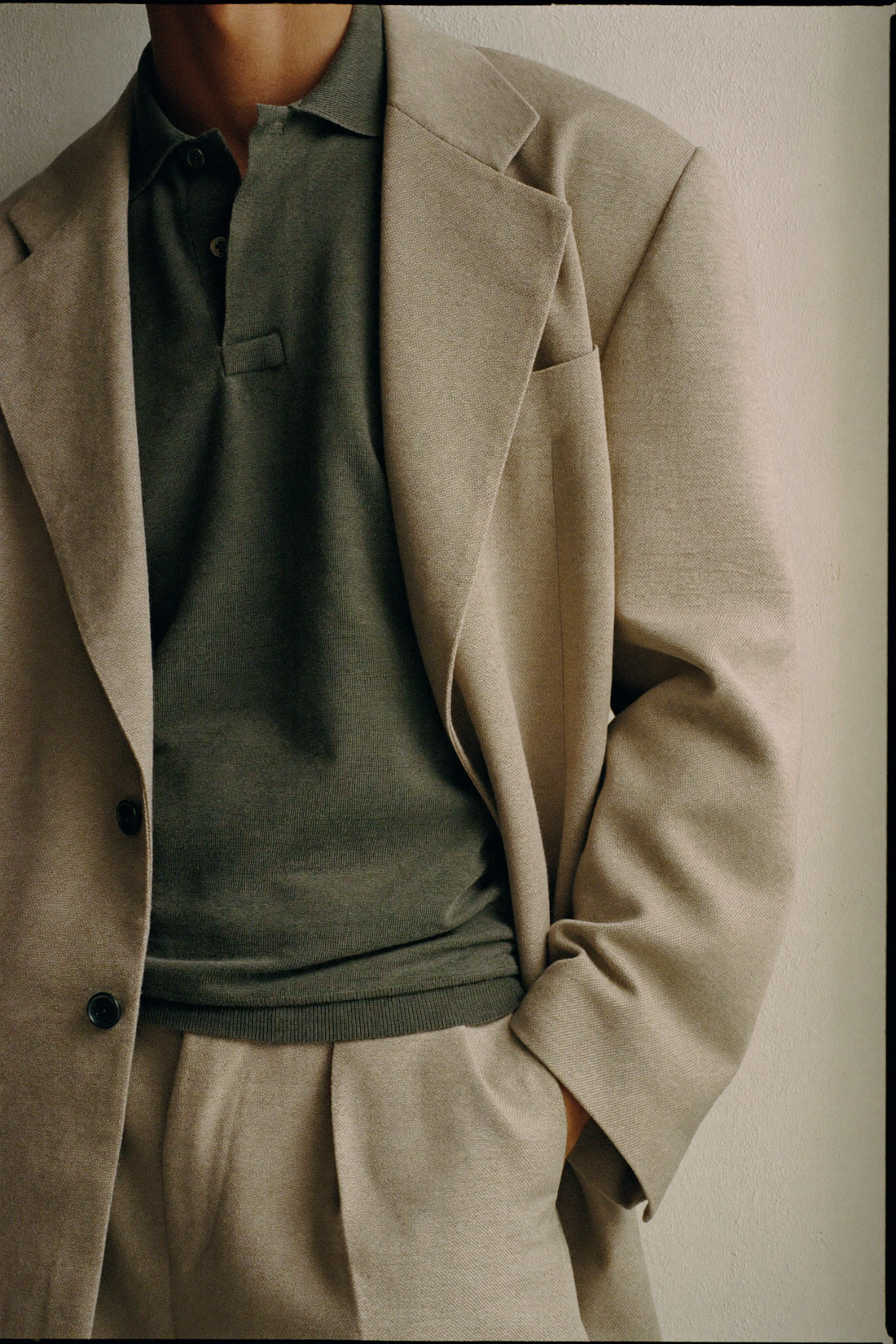 Knit polo under a jacket